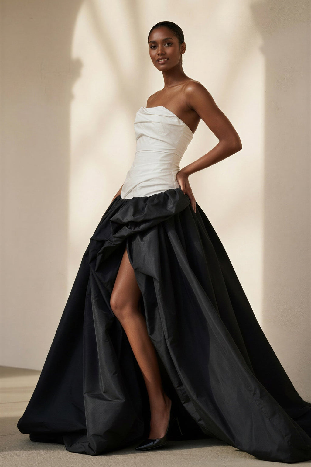 Pleated Strapless Gown With Slit in Black and Ivory